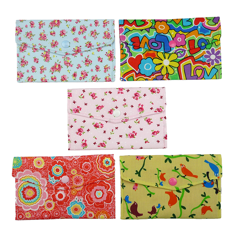 Handmade fabric button pouches in various designs – by Vicki Evans