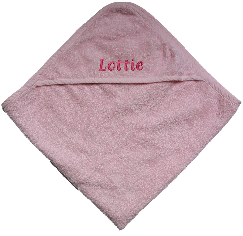 Pink personalised hooded baby towel — embroidered name gift by Vicki Evans